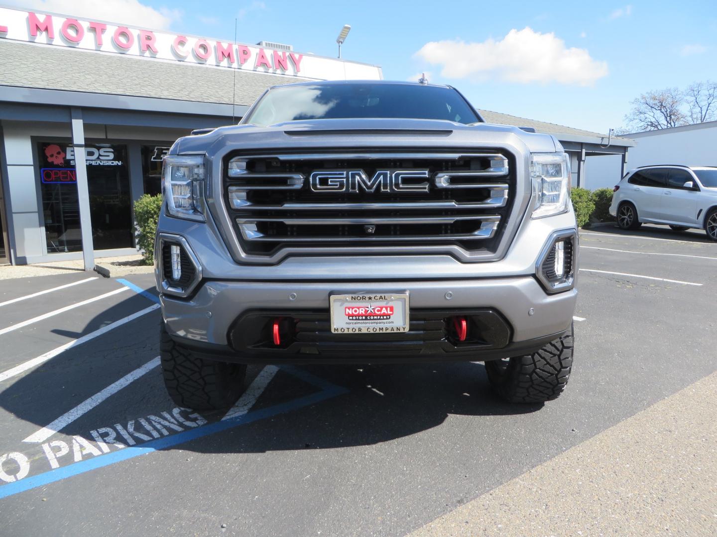 2019 CHARCOAL /BLACK GMC Sierra 1500 AT4 Crew Cab Long Box 4WD (1GTP9EEL6KZ) with an 6.2L V8 OHV 16V engine, 6A transmission, located at 2630 Grass Valley Highway, Auburn, CA, 95603, (530) 508-5100, 38.937893, -121.095482 - Dont miss this AT4 featuring a 4" RC lift kit kit, 35" Nitto Ridge Grappler tires, 20" Fuel Rebel wheels, Amp POwer steps, Air Bags, and a Tyger Bed cover. - Photo#1